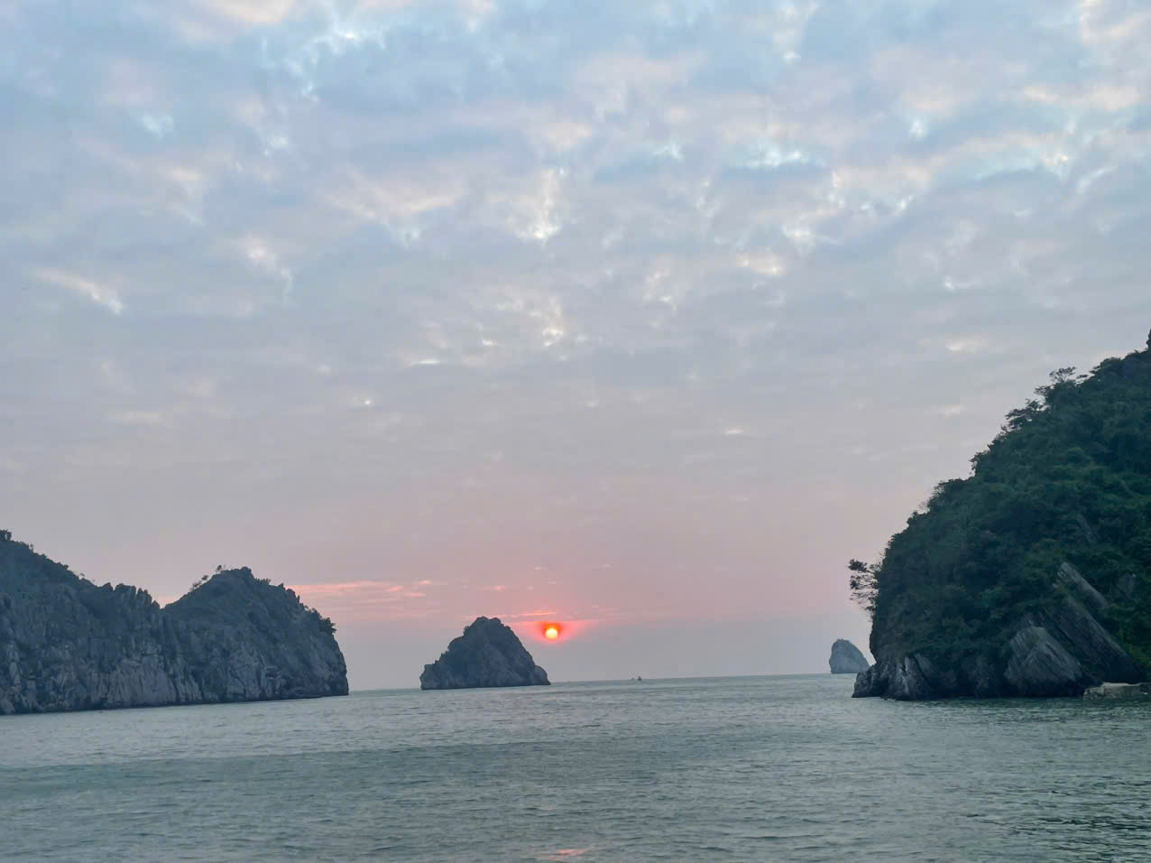 Witnessing the sunrise over Lan Ha Bay.